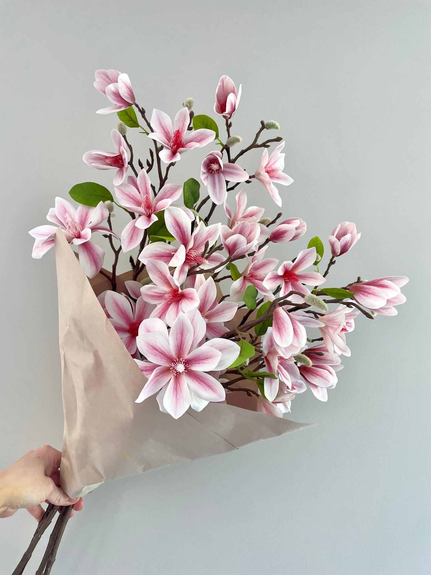 Faux magnolia arrangement