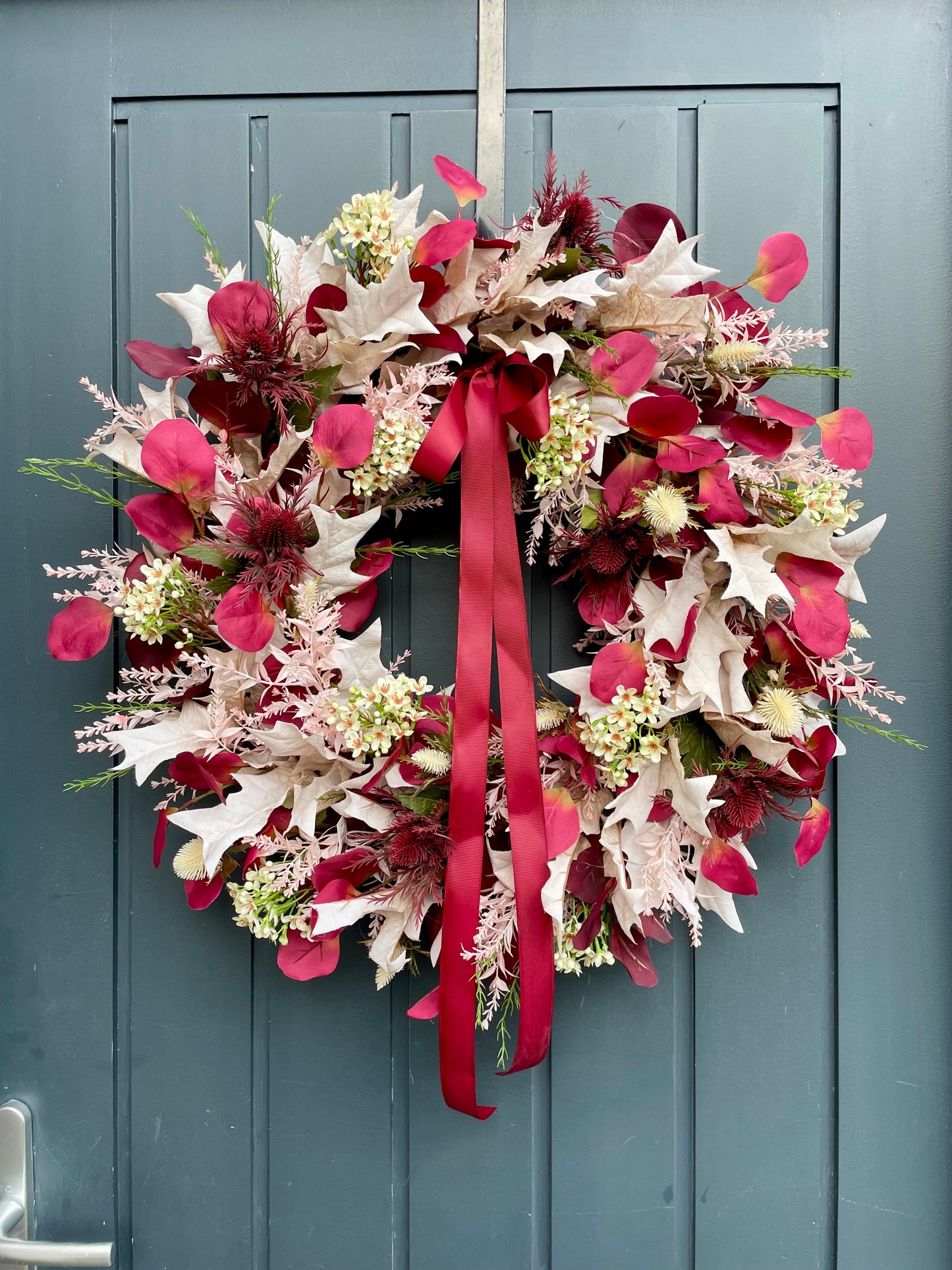Faux autumn eucalyptus and waxflower wreath
