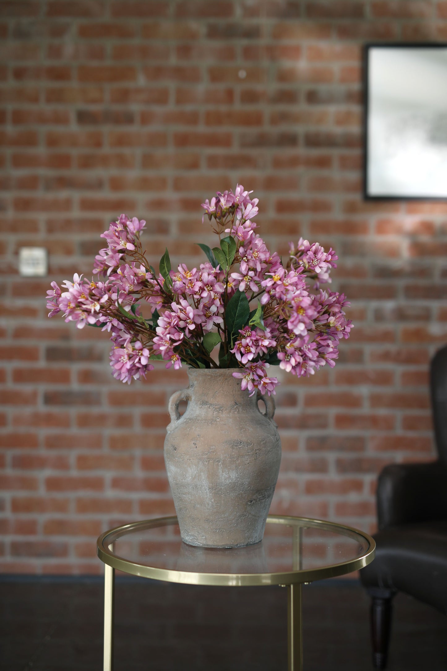 Faux mauve blossom arrangement