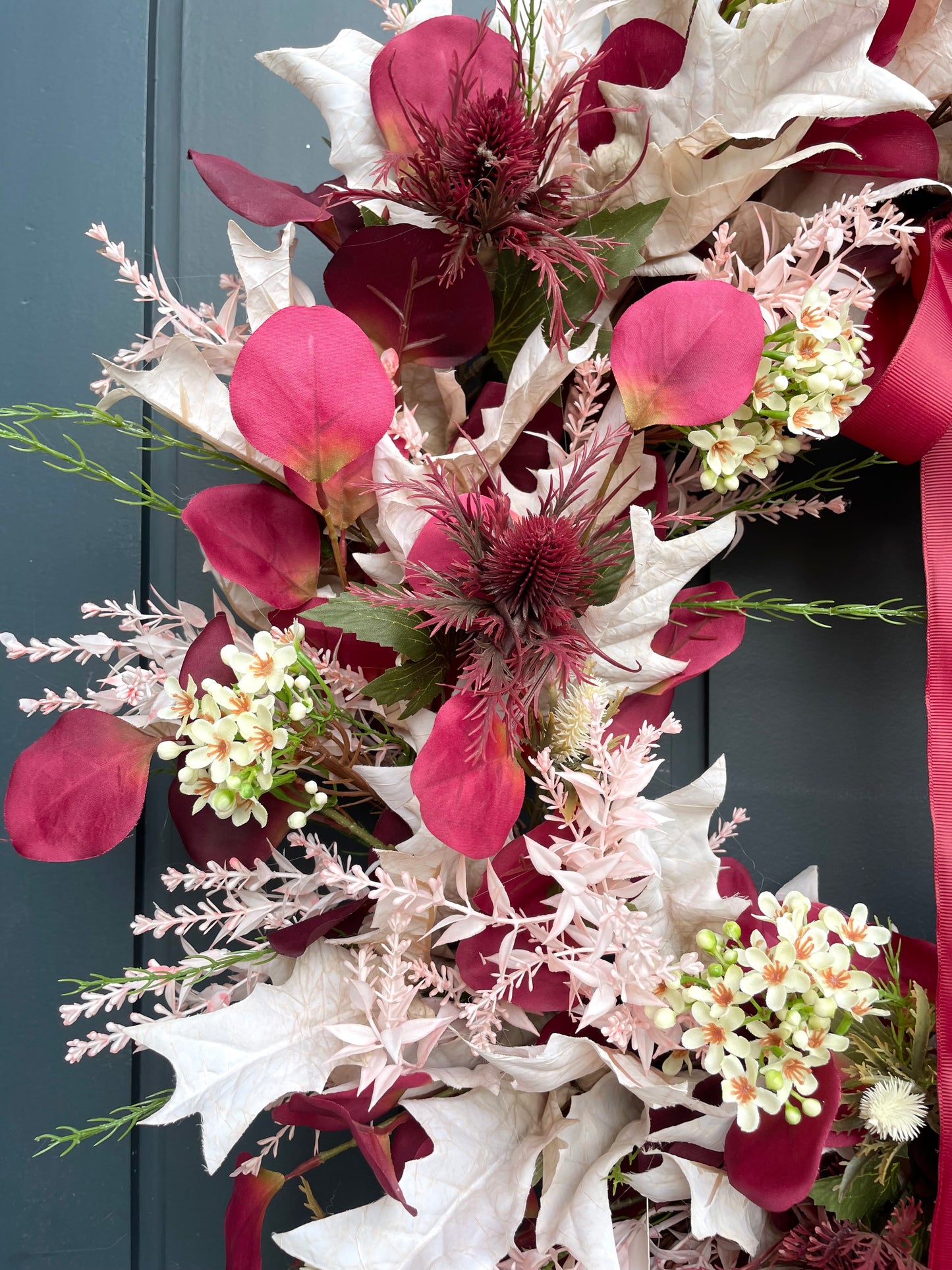 Faux autumn eucalyptus and waxflower wreath