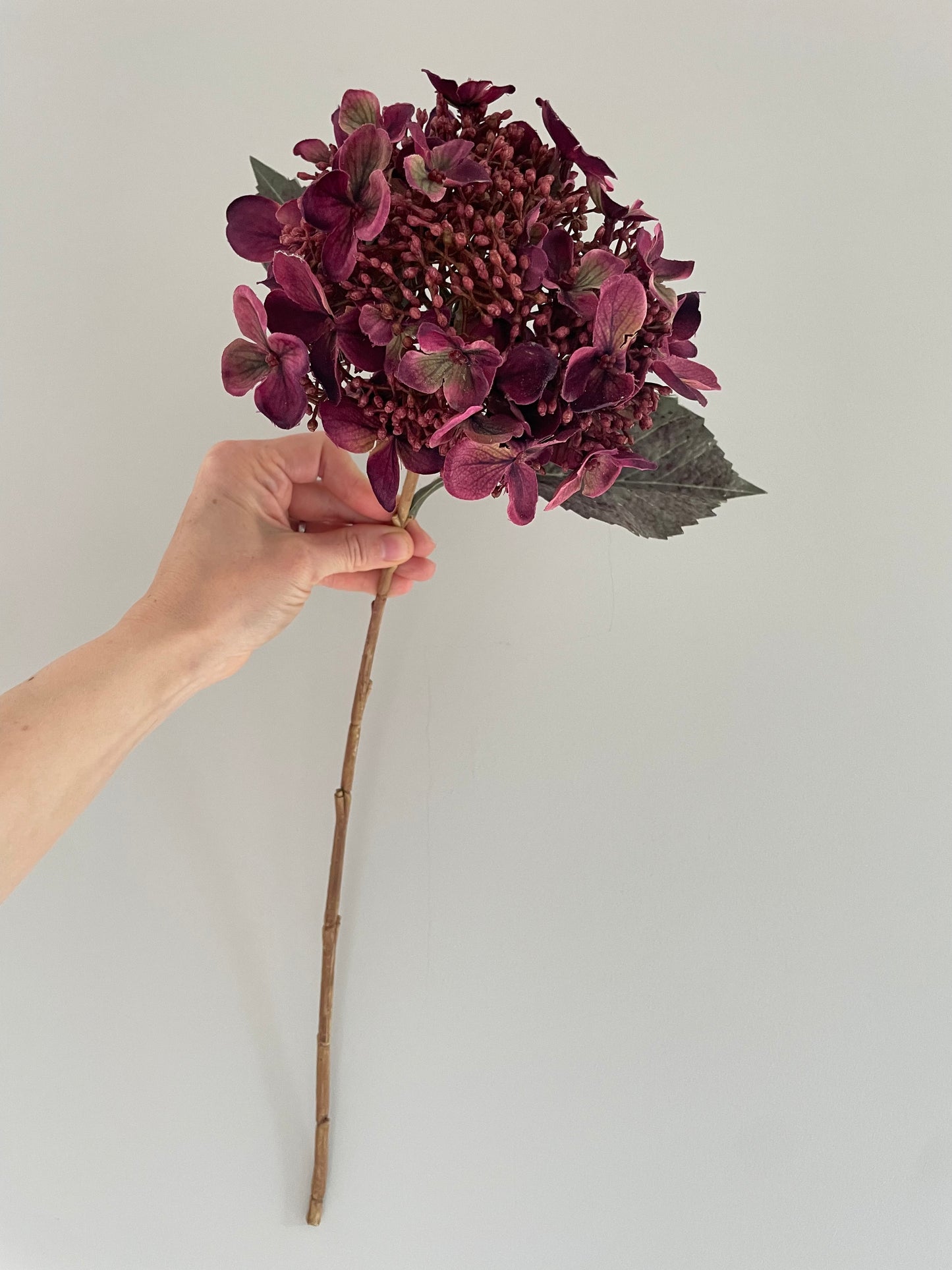 Faux burgundy hydrangea stem