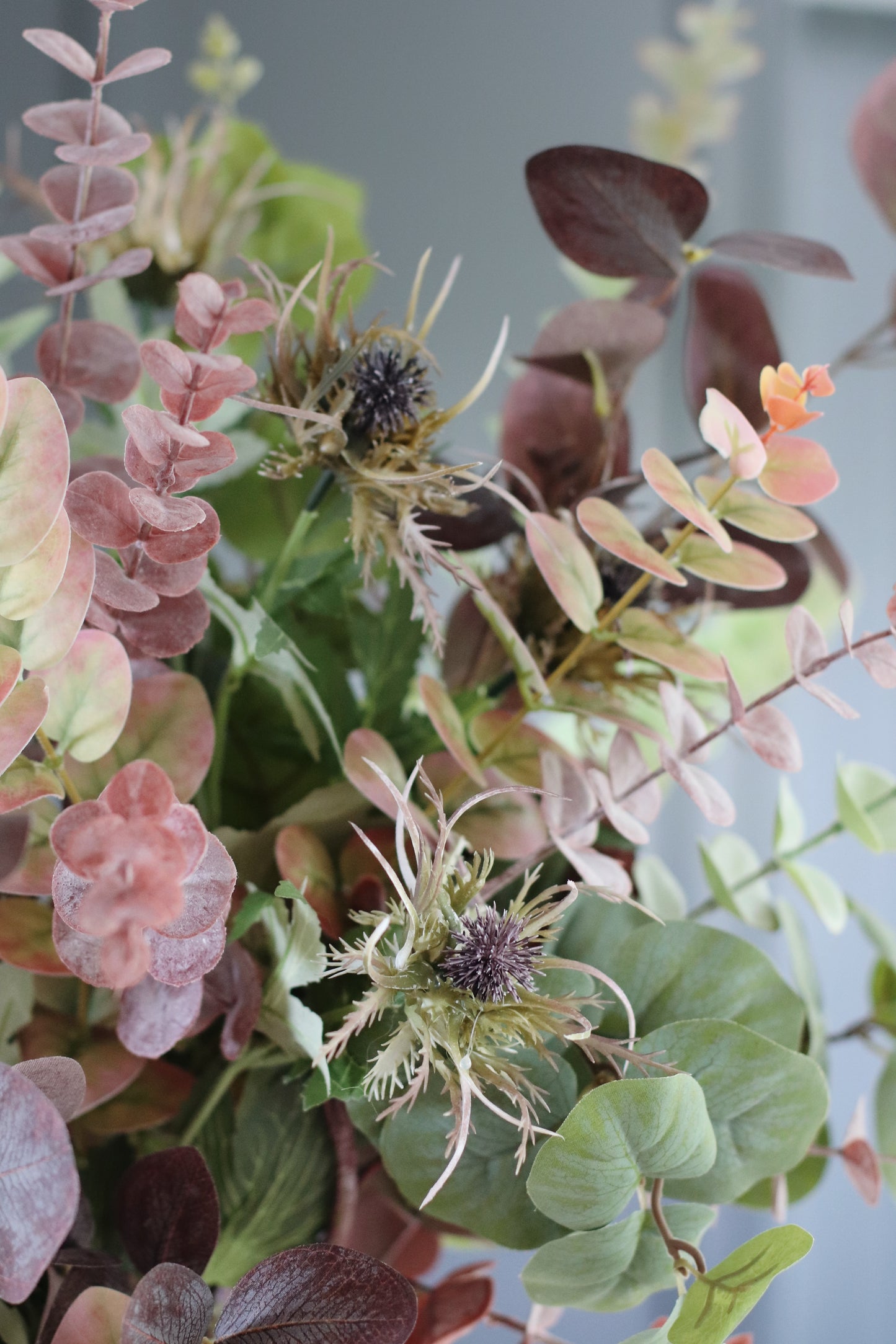 Faux autumn foliage arrangement
