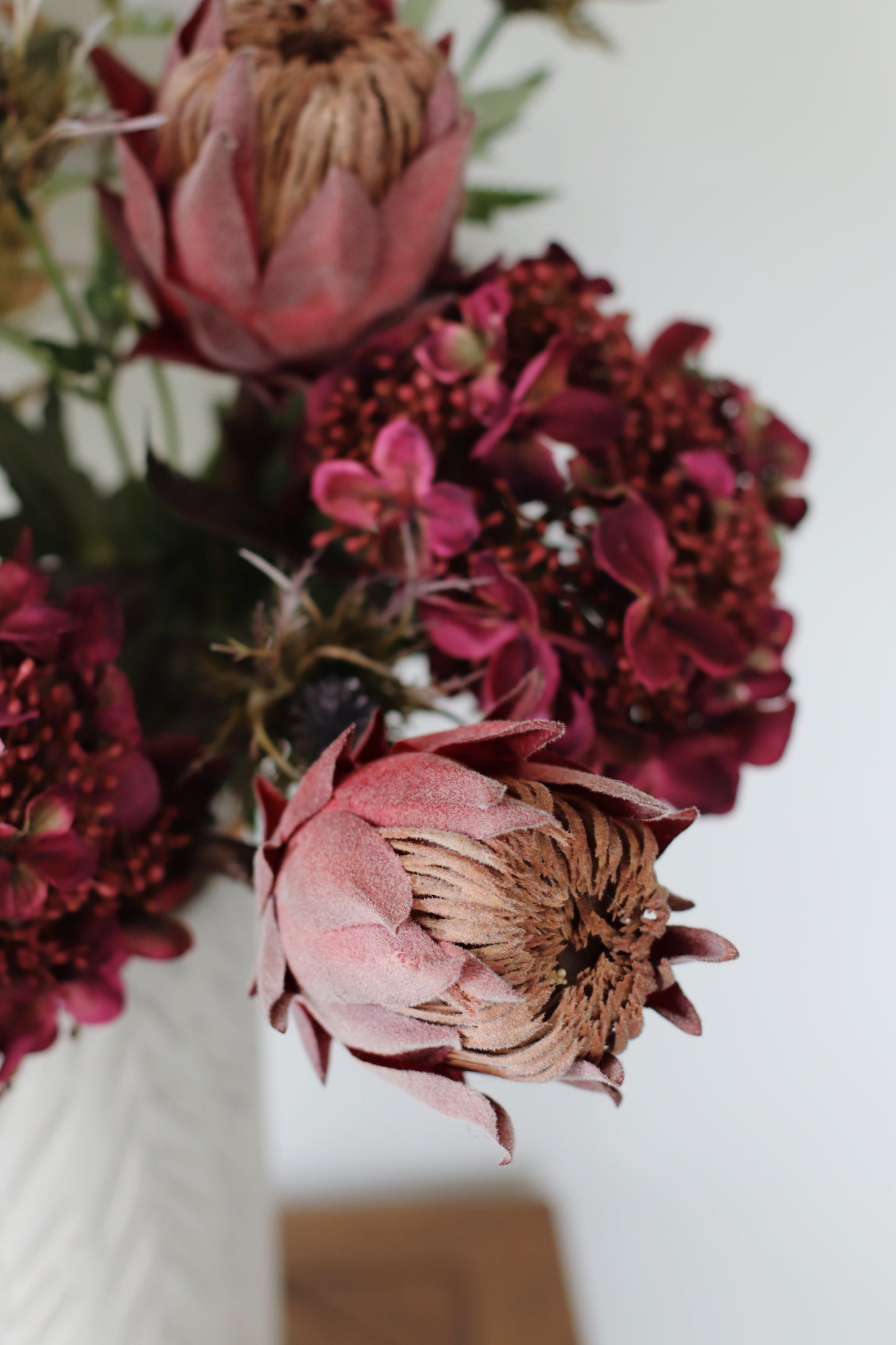 Faux Autumn protea & hydrangea arrangement