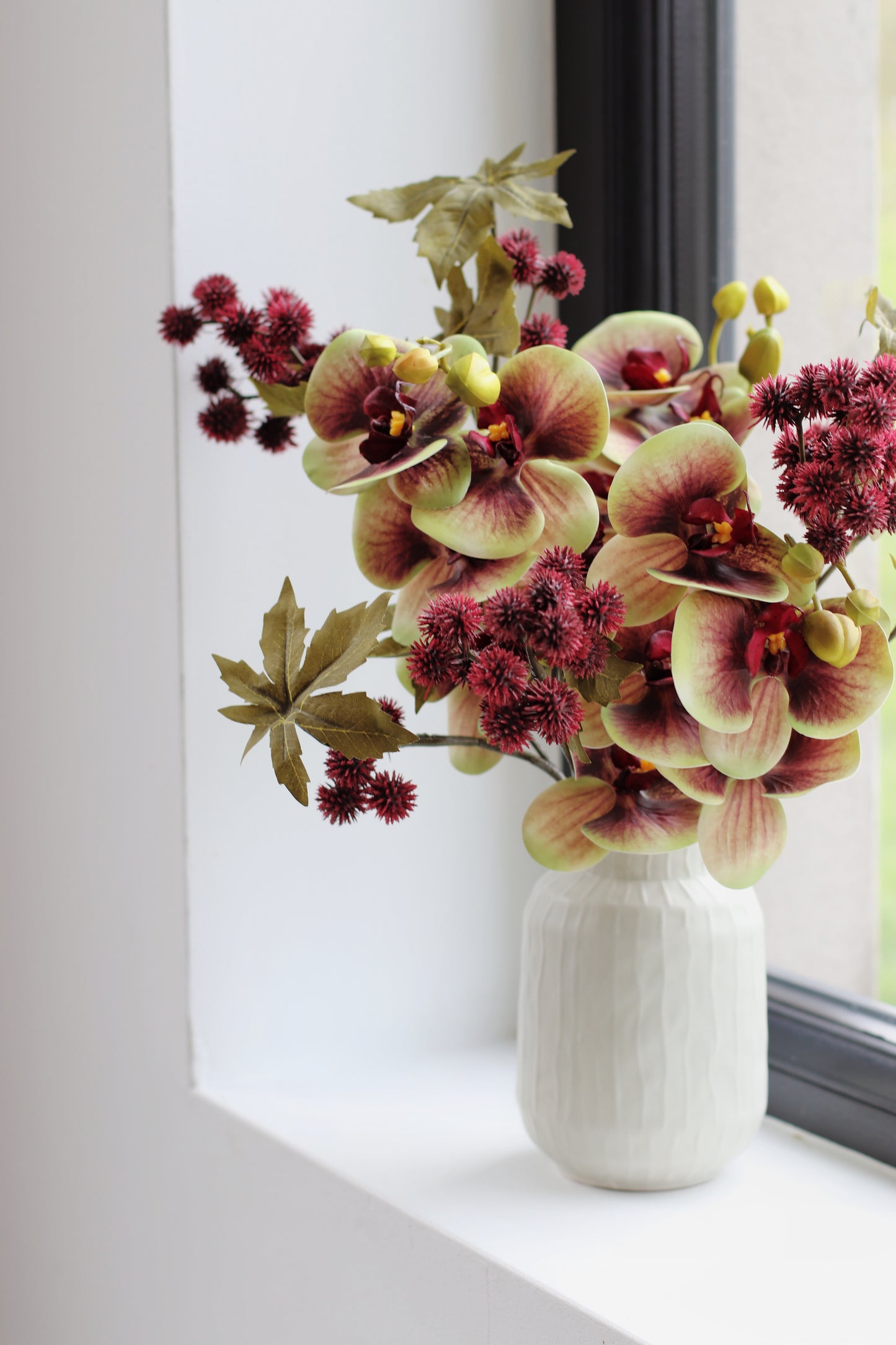 Faux orchid & Ricinus posy