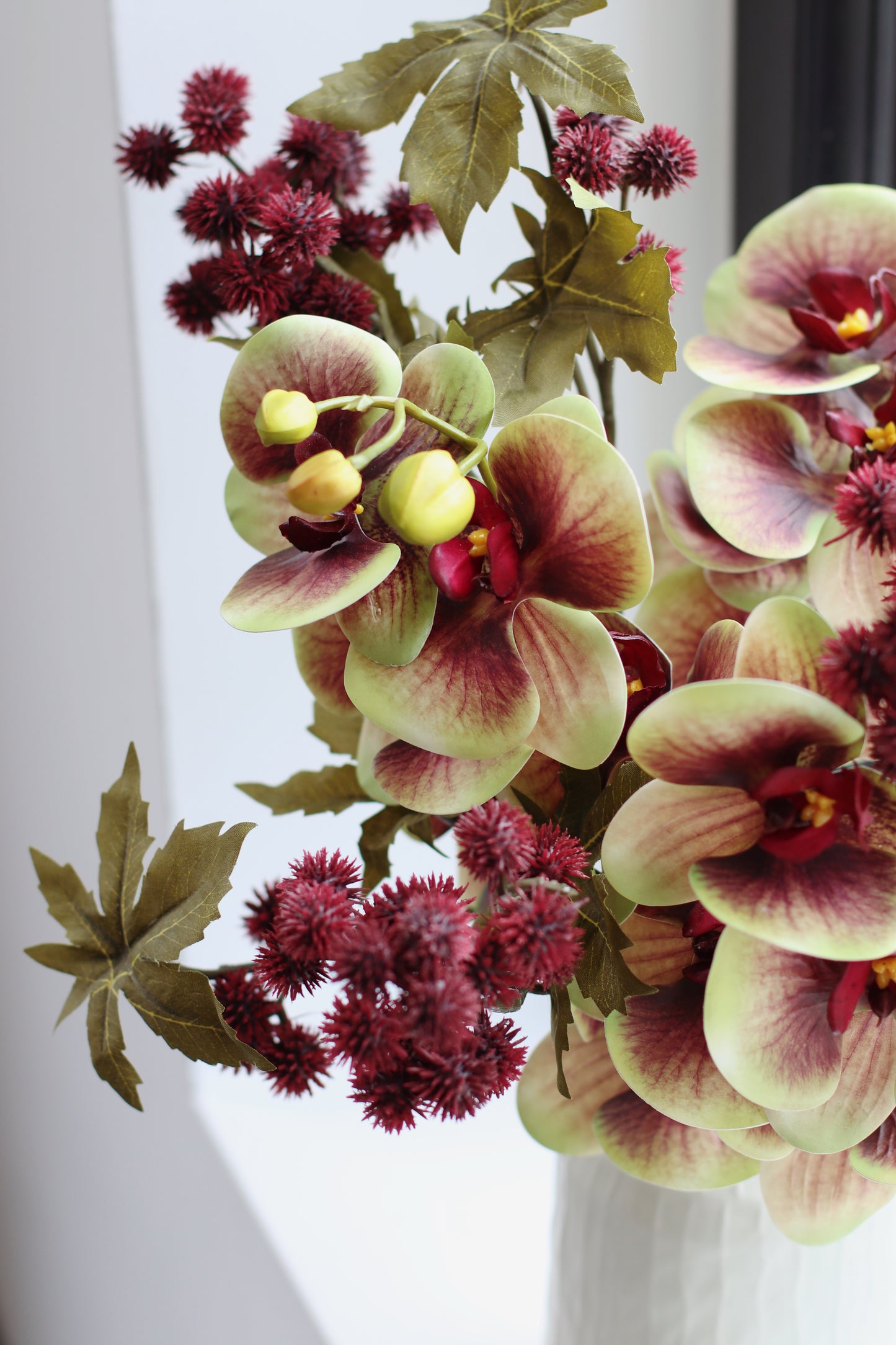 Faux orchid & Ricinus posy
