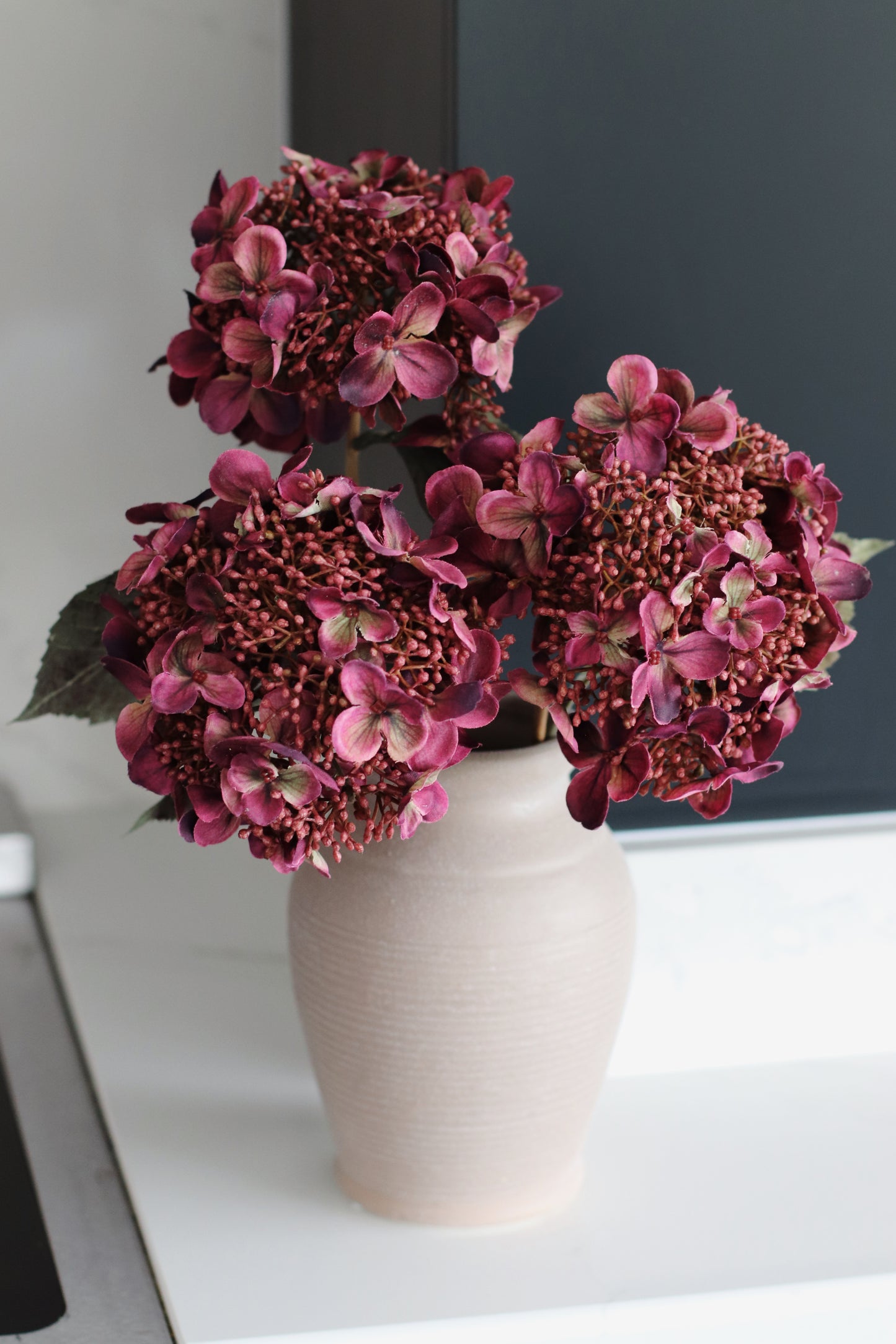 Faux burgundy hydrangea stem