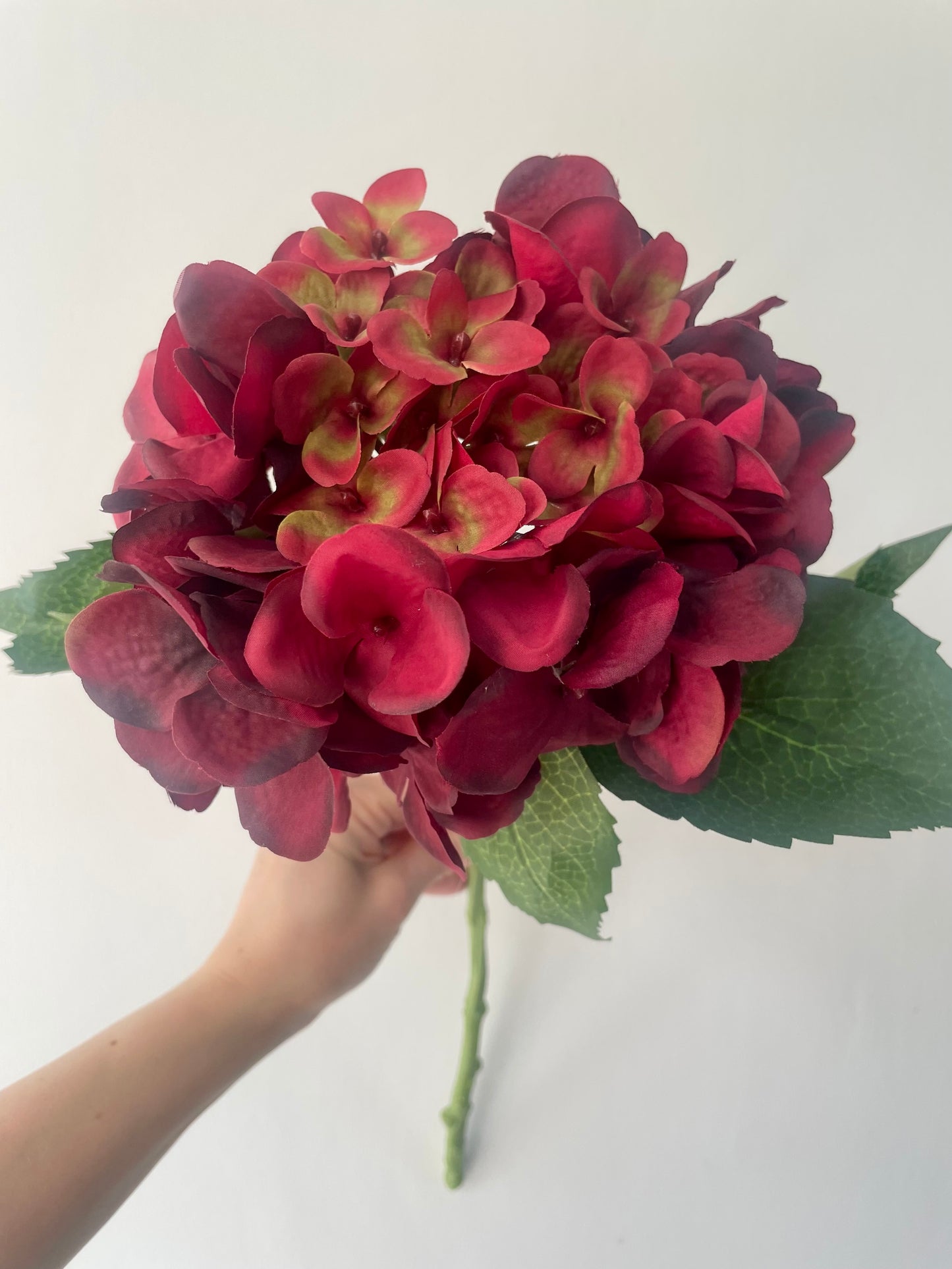 Faux rich red hydrangea stem