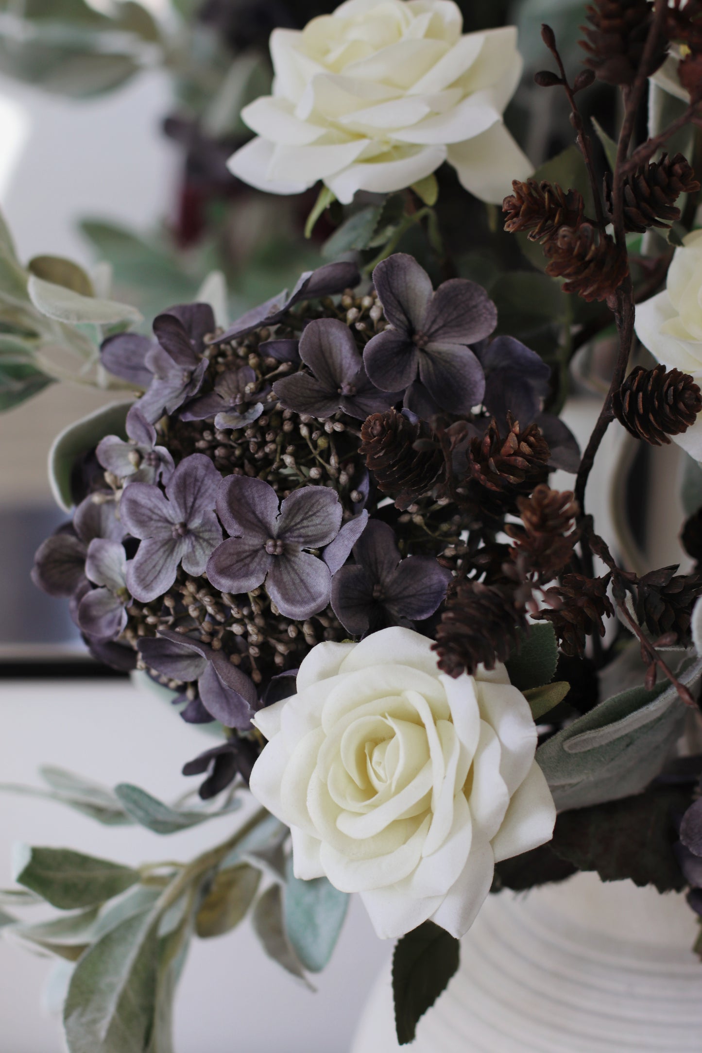 Faux winter hydrangea arrangement