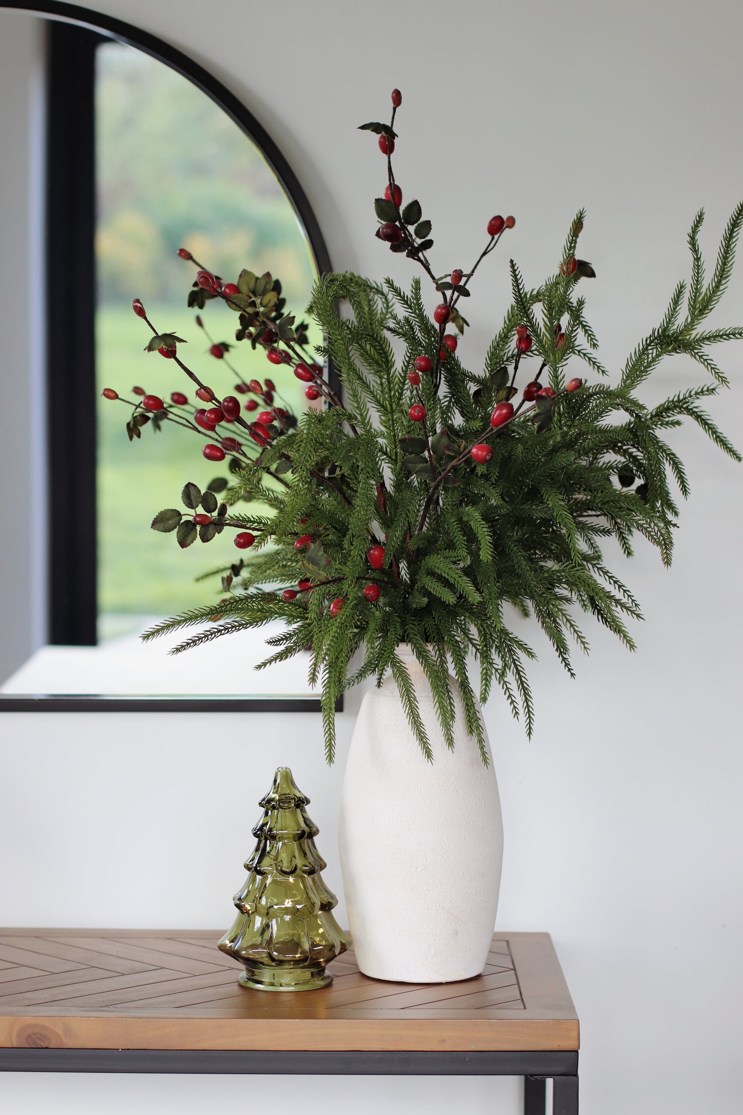 Faux norfolk pine & rosehip arrangement