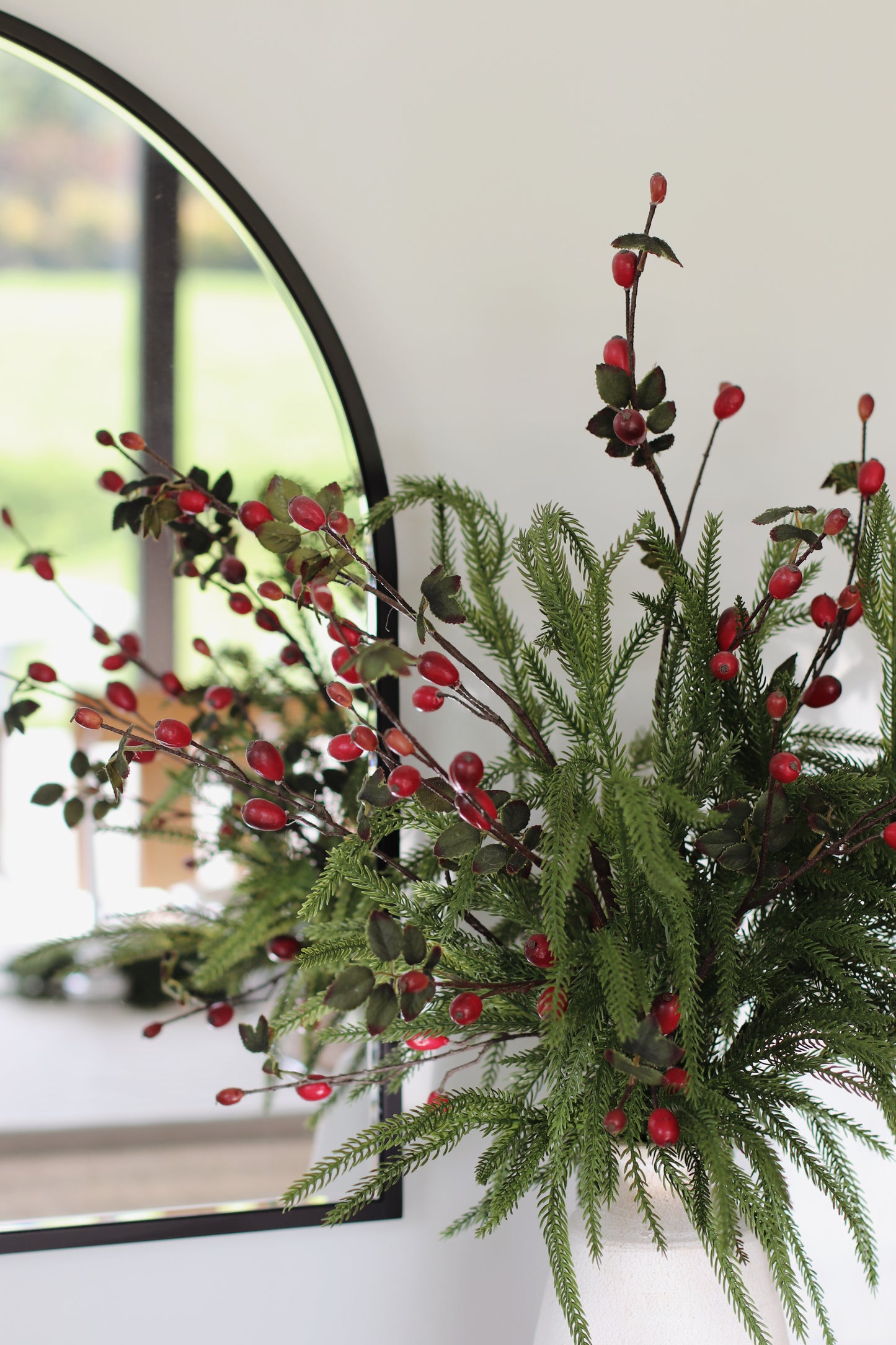 Faux norfolk pine & rosehip arrangement