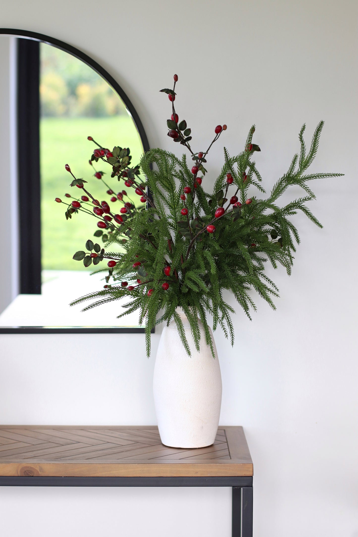 Faux norfolk pine & rosehip arrangement