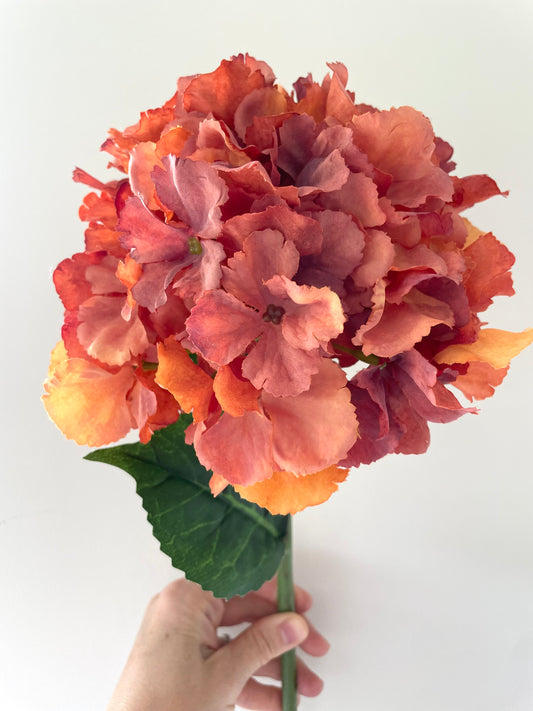 Faux rust orange hydrangea stem