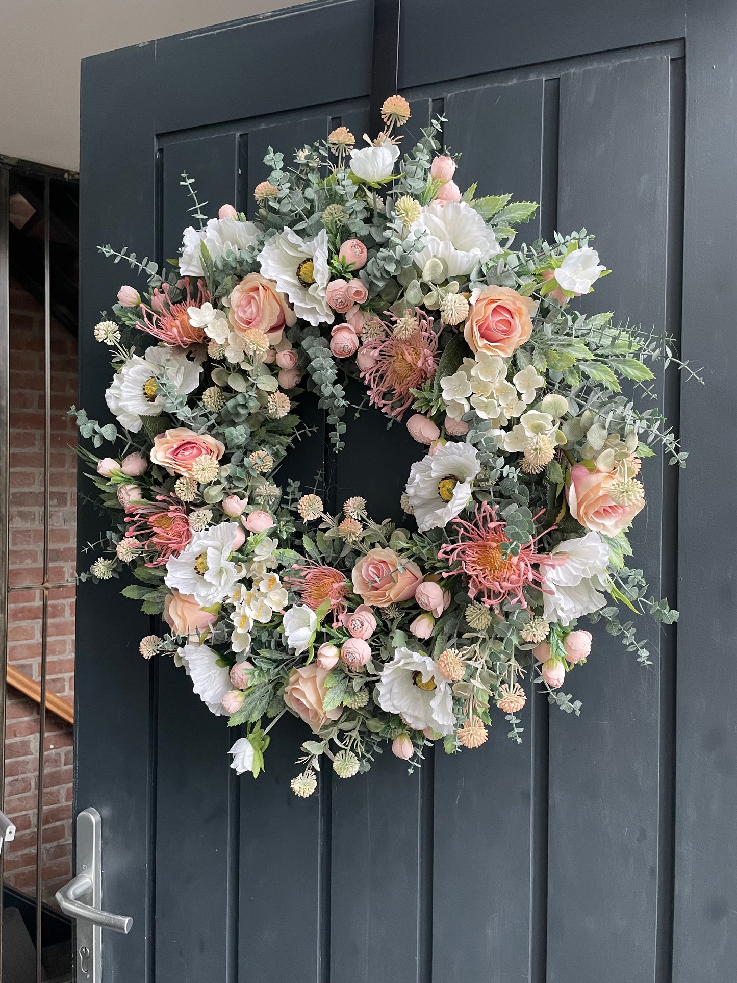 Faux peaches and cream wreath