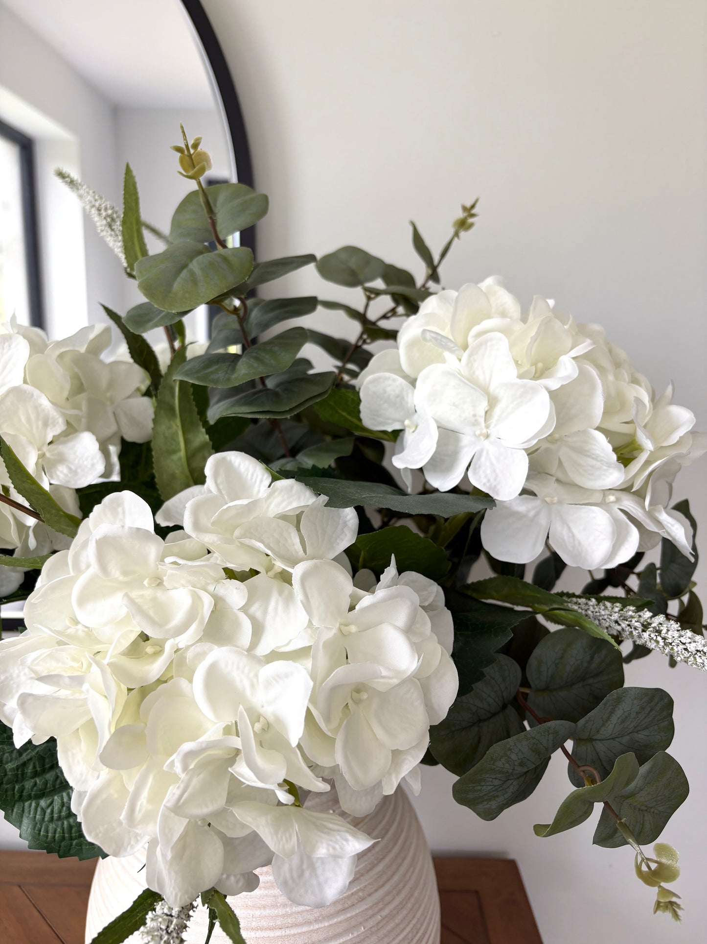 Faux ivory hydrangea arrangement