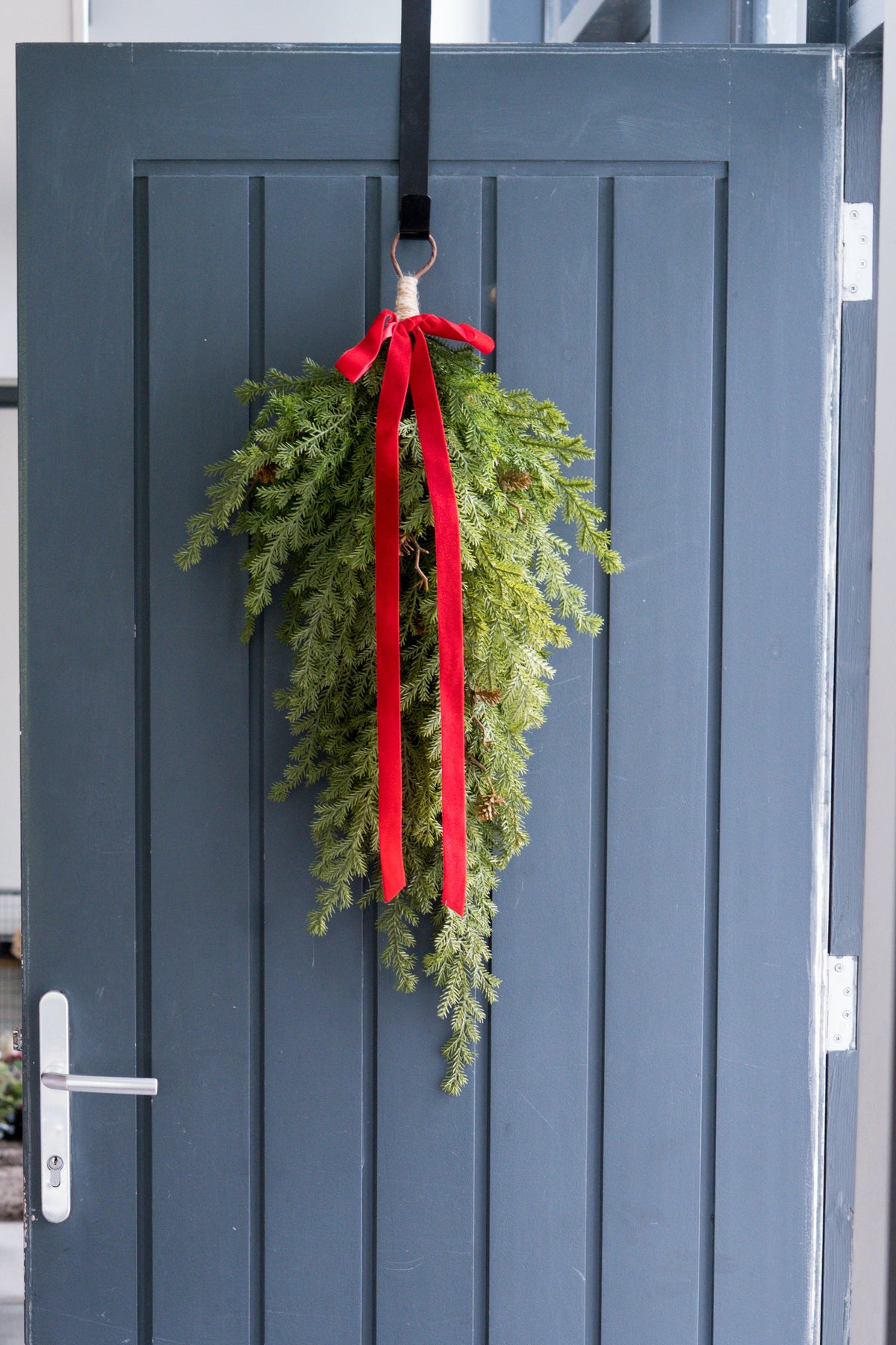 Faux fir swag with red bow