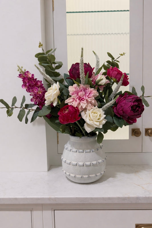 Faux pink abundance arrangement