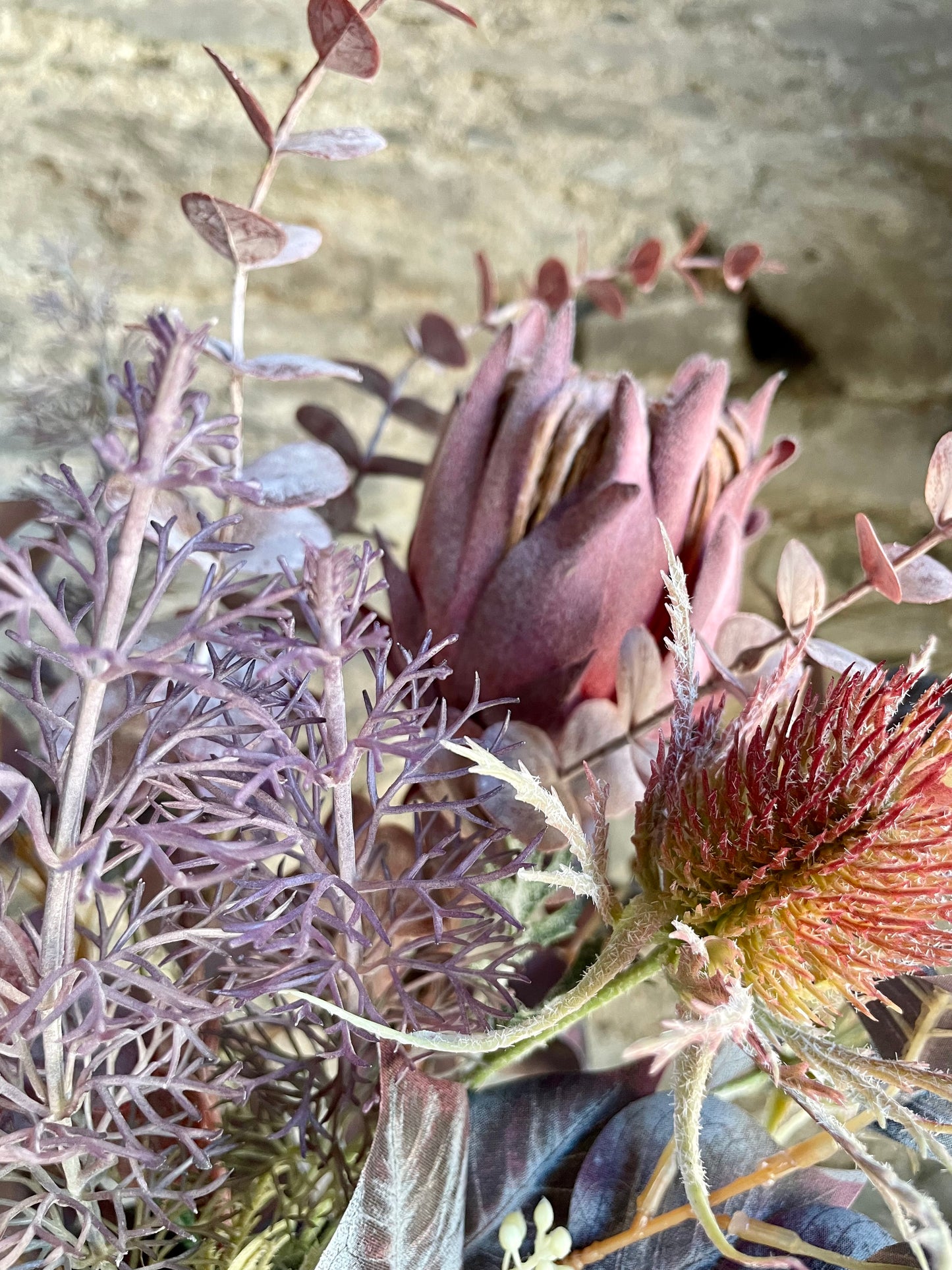 Faux protea arrangement