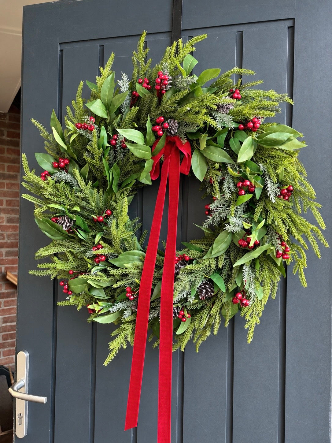 Faux red berry wreath