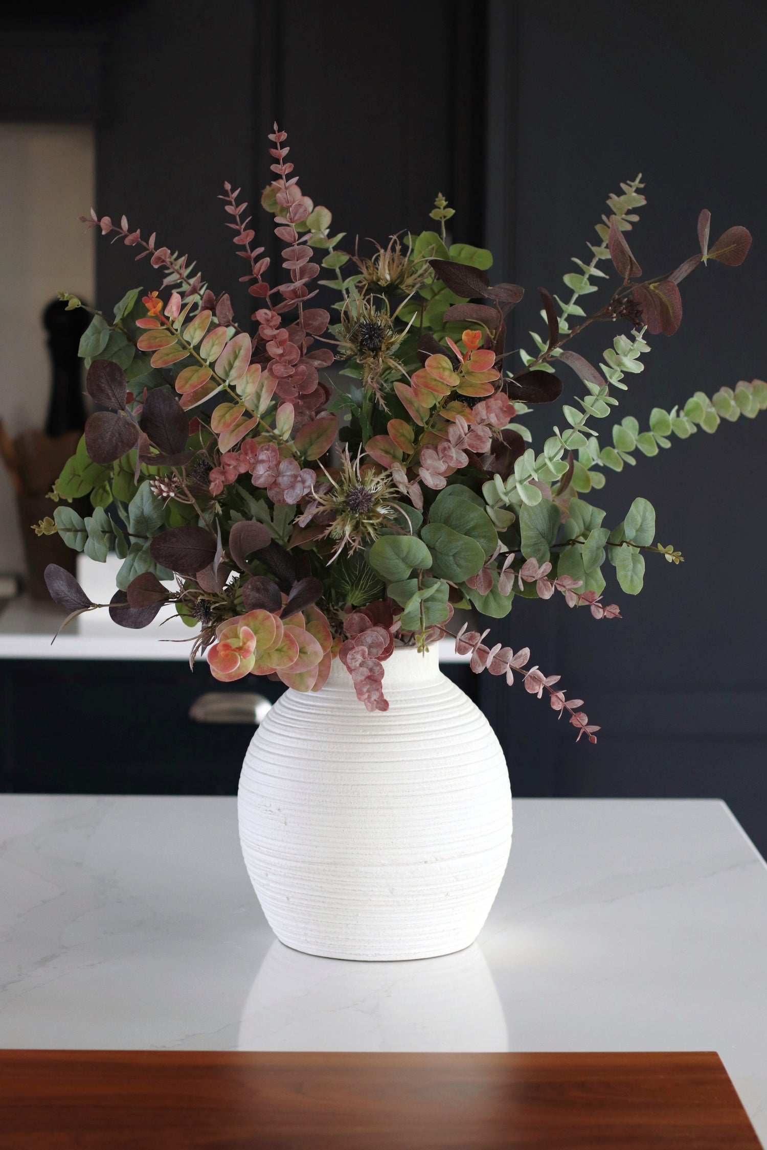 Faux flower arrangements