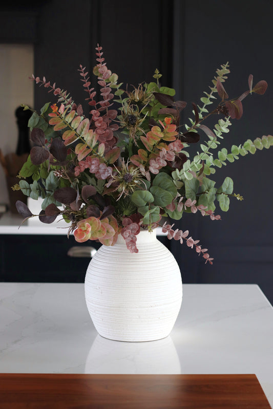 Faux autumn foliage arrangement