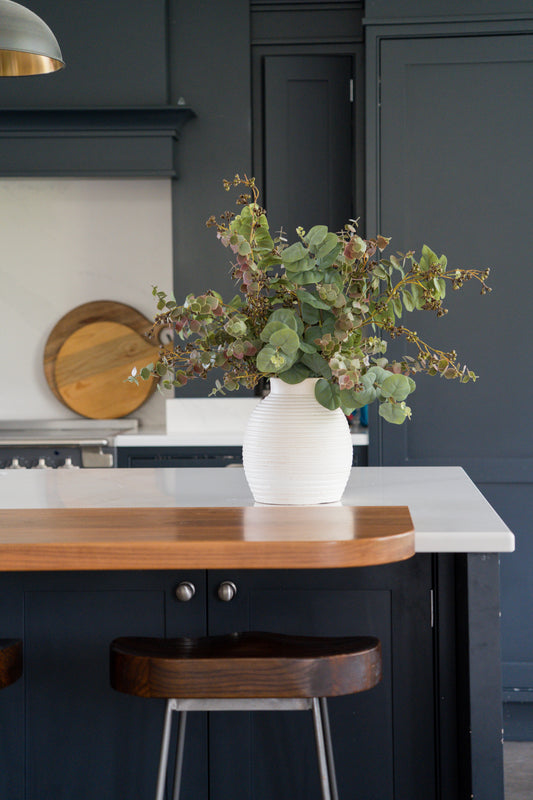 Faux moss green foliage arrangement