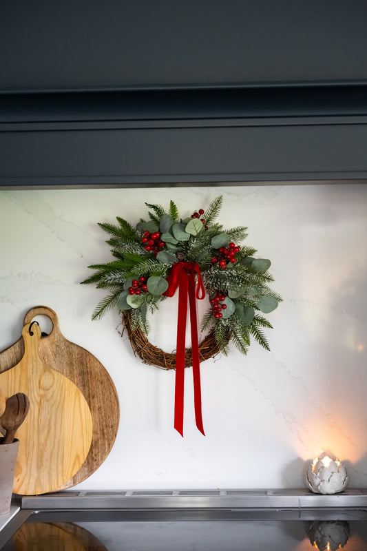 Faux red berry wreath